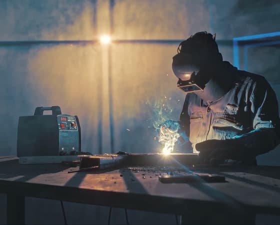 PESCO welder at work in the fabrication shop