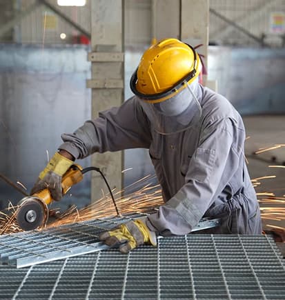 A Prime Star worker inspecting a process skid on site