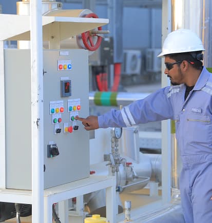 PESCO technician testing a control panel