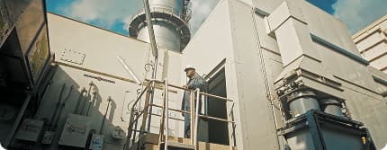 A PESCO engineer on the access platform of a gas turbine