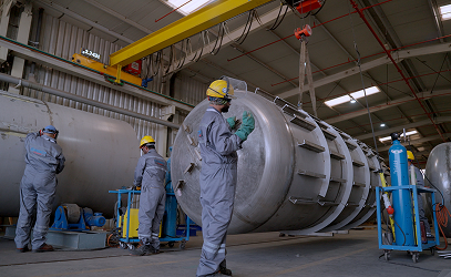 Fabricators working on a pressure vessel in the PESCO workshop